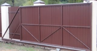 Купить откатные ворота из профнастила Еманжелинск, цена от 1769 руб.