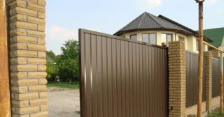 Купить откатные ворота из профнастила Еманжелинск, цена от 1769 руб.